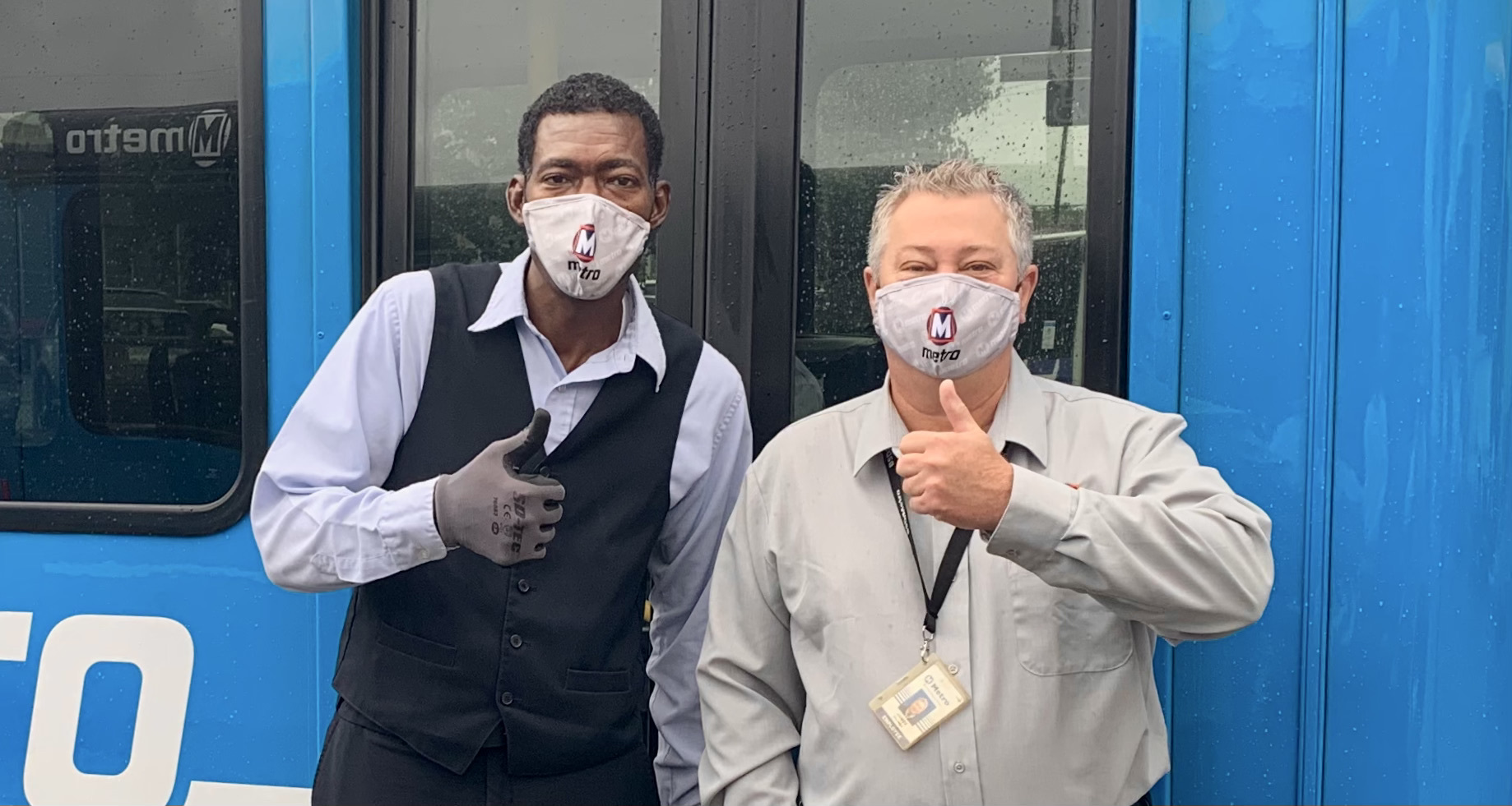 Metro Call-A-Ride Operators of the Year, Jerome Papkin and James Belleville celebrate with a thumbs up!